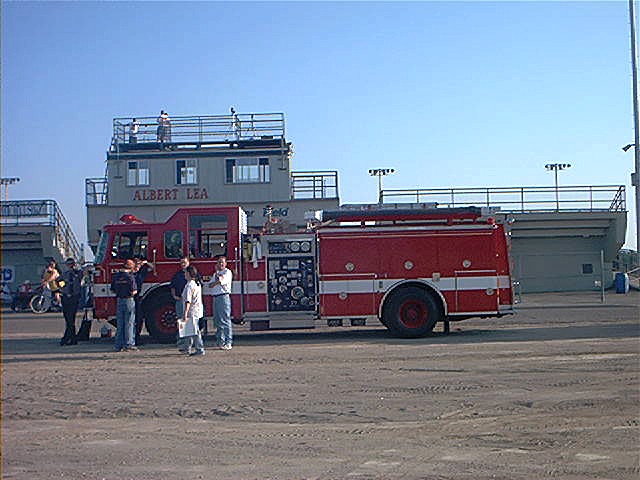 ny_firemen_standing_by_engine_917.jpg